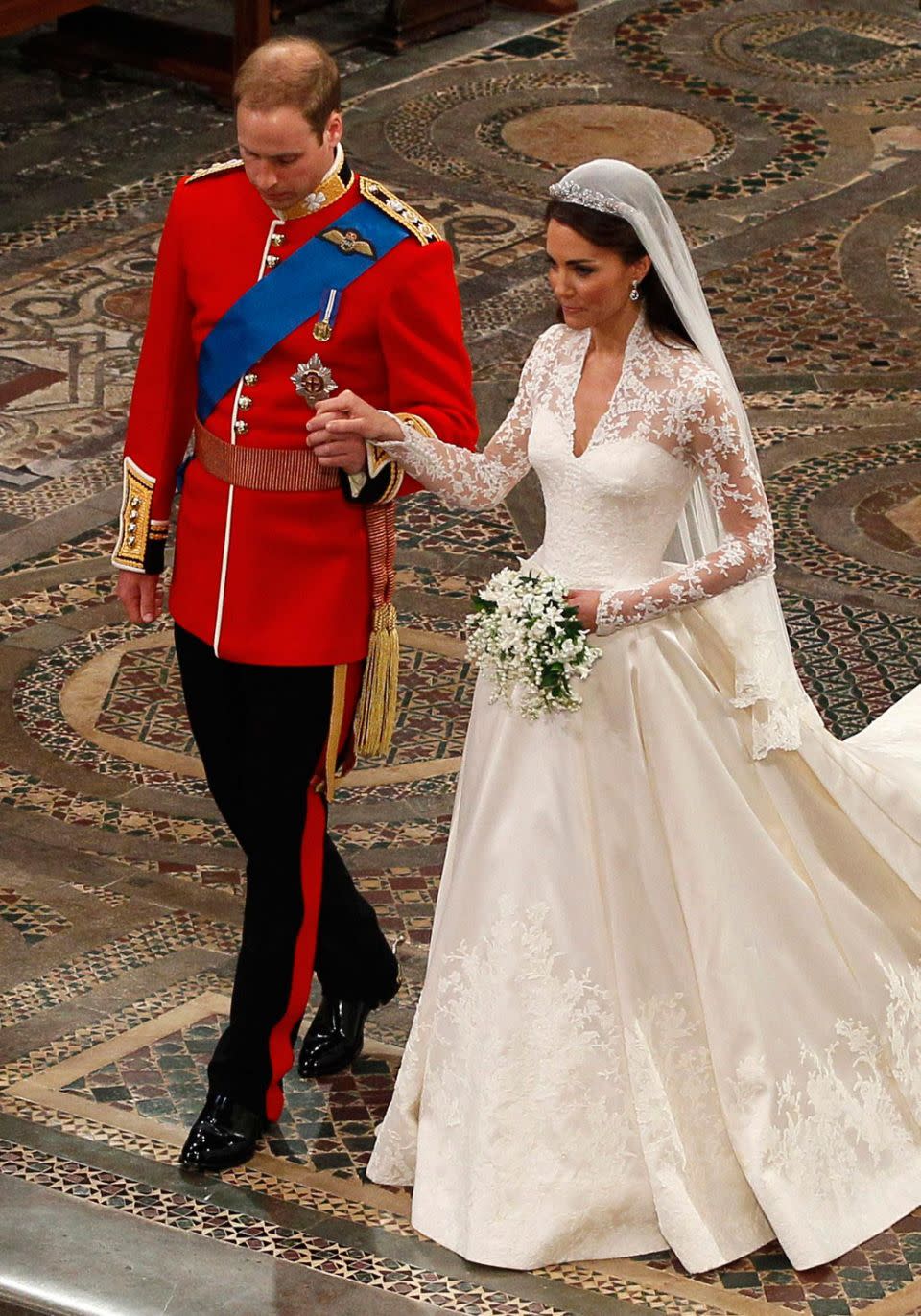 And of course, Kate wore a lace dress by Sarah Burton for her wedding to Prince William in 2011. Photo: Getty