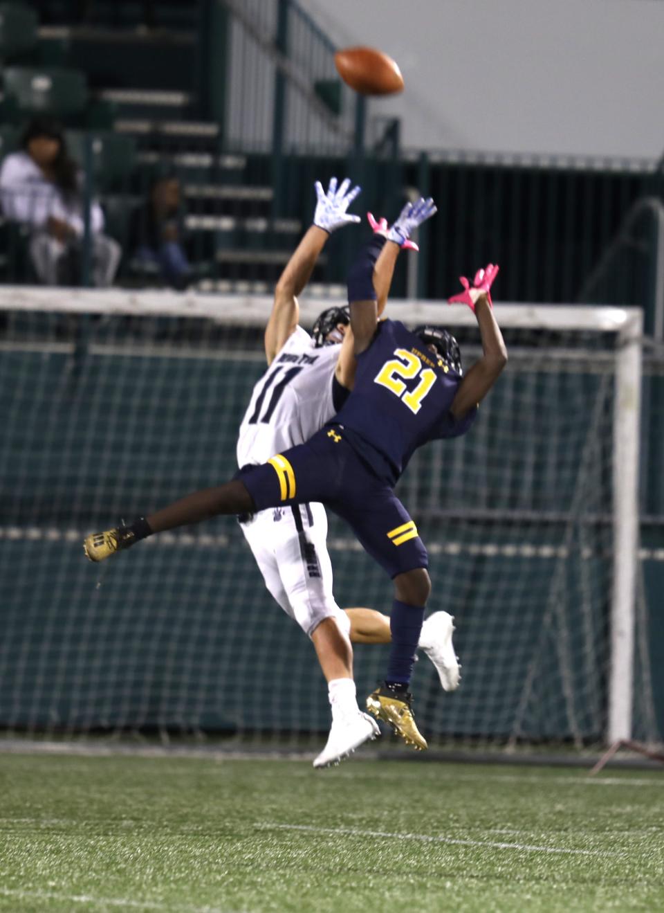 Brighton receiver Ellis Einbinder goes up for a pass that ended up being broken up by UPrep defensive back Styhles McKenzie-Baker (21) during a game in 2021.