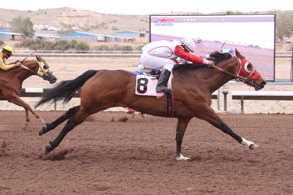 Pattys Saint, ridden by Jesus Virgen, edges clear of her rivals as she wins the $75,000 Animas Stakes, Saturday, May 28, 2022 at SunRay Park and Casino.