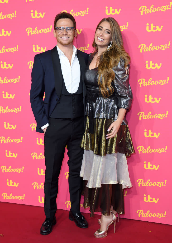 Solomon has shared her body insecurities with fans on Instagram, pictured in November 2019 with fiance Joe Swash. (Getty Images)