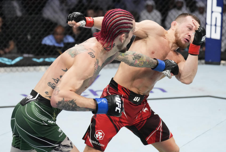 Sean O'Malley, pictured here punching Petr Yan during their bantamweight fight at UFC 280.