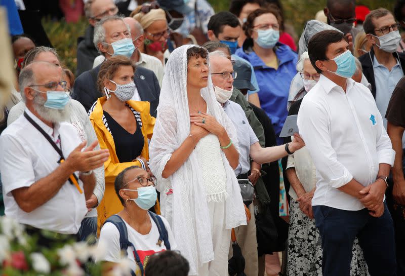 French Catholics gather at Notre Dame Cathedral square