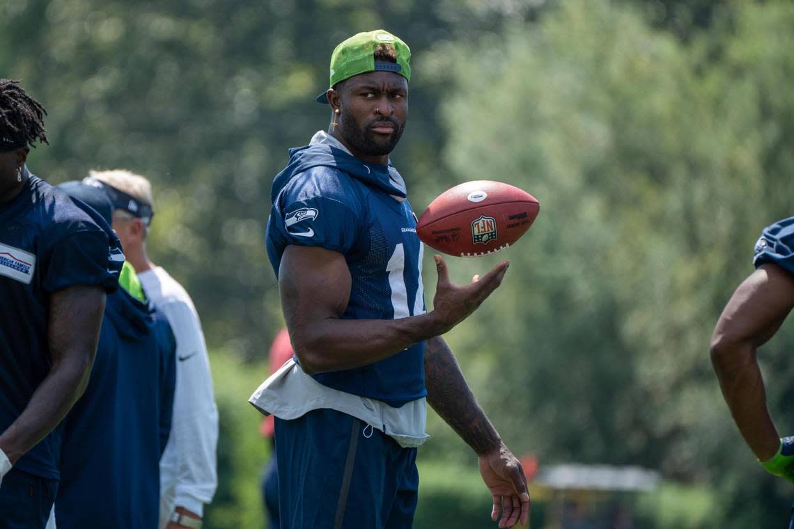 Seattle Seahawks wide receiver DK Metcalf surveys his surroundings during the first day of training camp at the Virginia Mason Athletic Center on July 27, 2022.