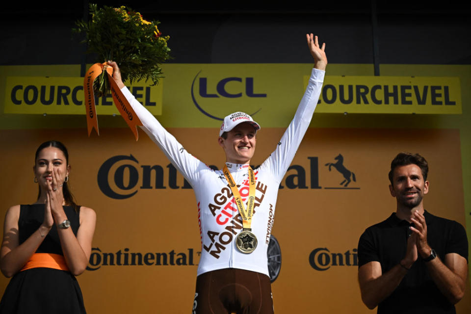 AG2R Citroen Team's Austrian rider Felix Gall celebrates on the podium after winning the 17th stage of the 110th edition of the Tour de France cycling race, 166 km between Saint-Gervais Mont-Blanc and Courchevel, in the French Alps, on July 19, 2023. (Photo by Marco BERTORELLO / AFP)