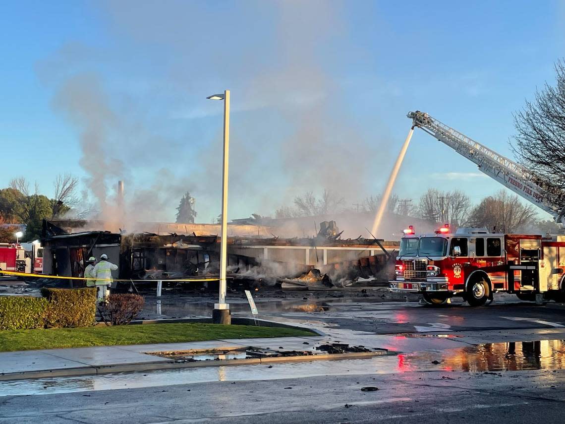 A strip mall at Kings Canyon Road and Phillip Avenue caught fire Friday, Jan. 6, 2023, in southeast Fresno, California. JOSHUA TEHEE/jtehee@fresnobee.com