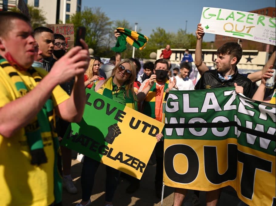 <p>Manchester United fans protest against the Glazers</p> (AFP via Getty Images)