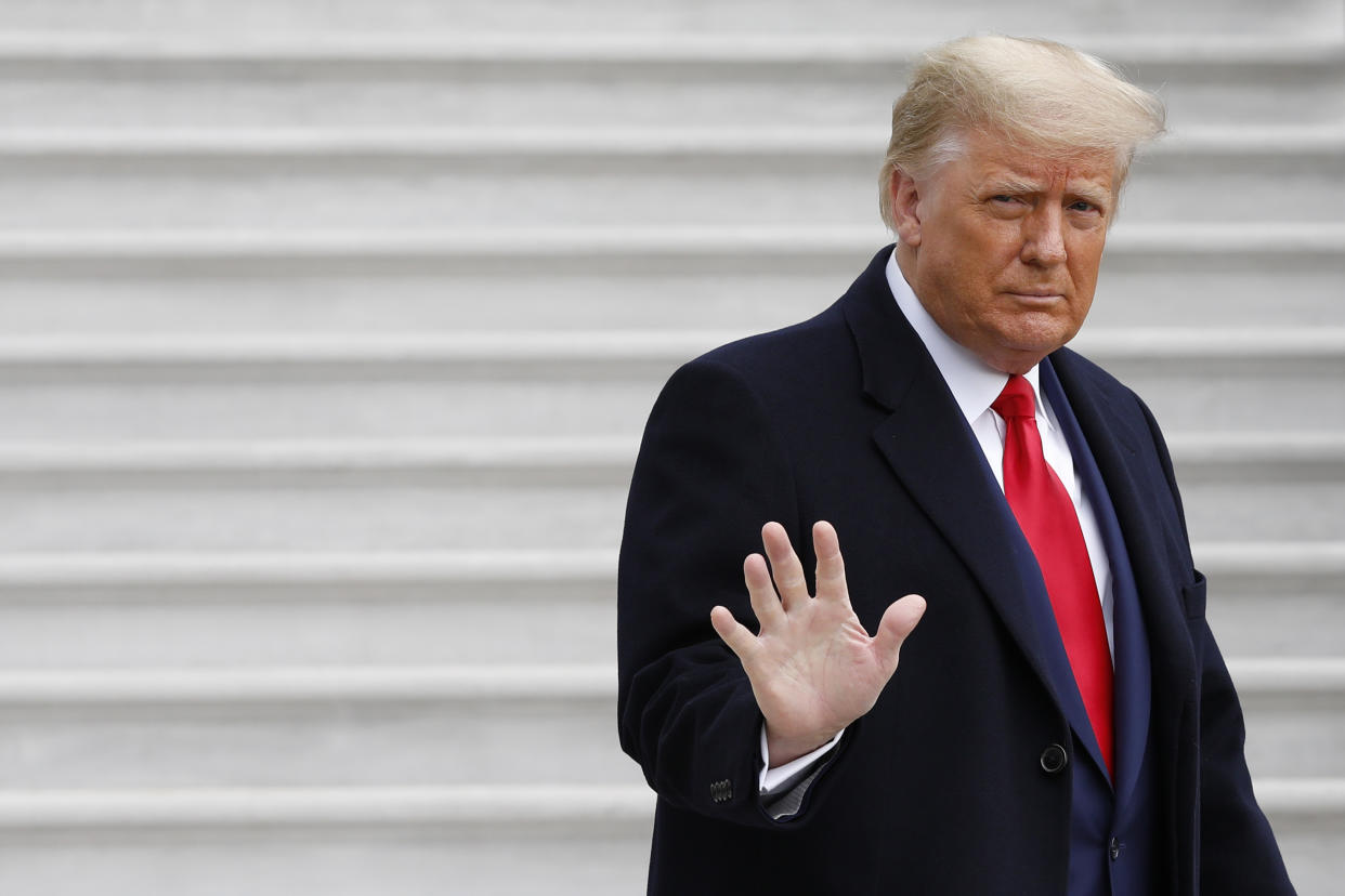 U.S. President Donald Trump waves to members of the media before boarding Marine One on the South Lawn of the White House in Washington, D.C., U.S., on Saturday, Dec. 12, 2020. Trump is going to attend the 121st Army-Navy Football Game at United States Military Academy in West Point, NY. Photographer: Yuri Gripas/Pool/Sipa USA