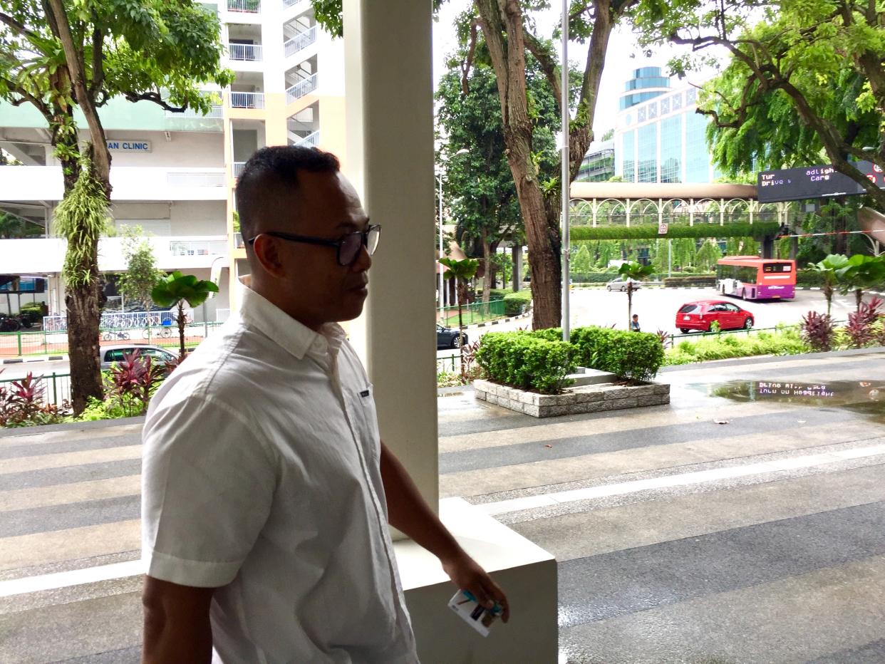 (Sollihin Anhar, who helped orchestrate car accidents to cheat insurance companies of more than $300,000 was jailed nine years on Monday (18 June). PHOTO: Abdul Rahman Azhari/Yahoo News Singapore)