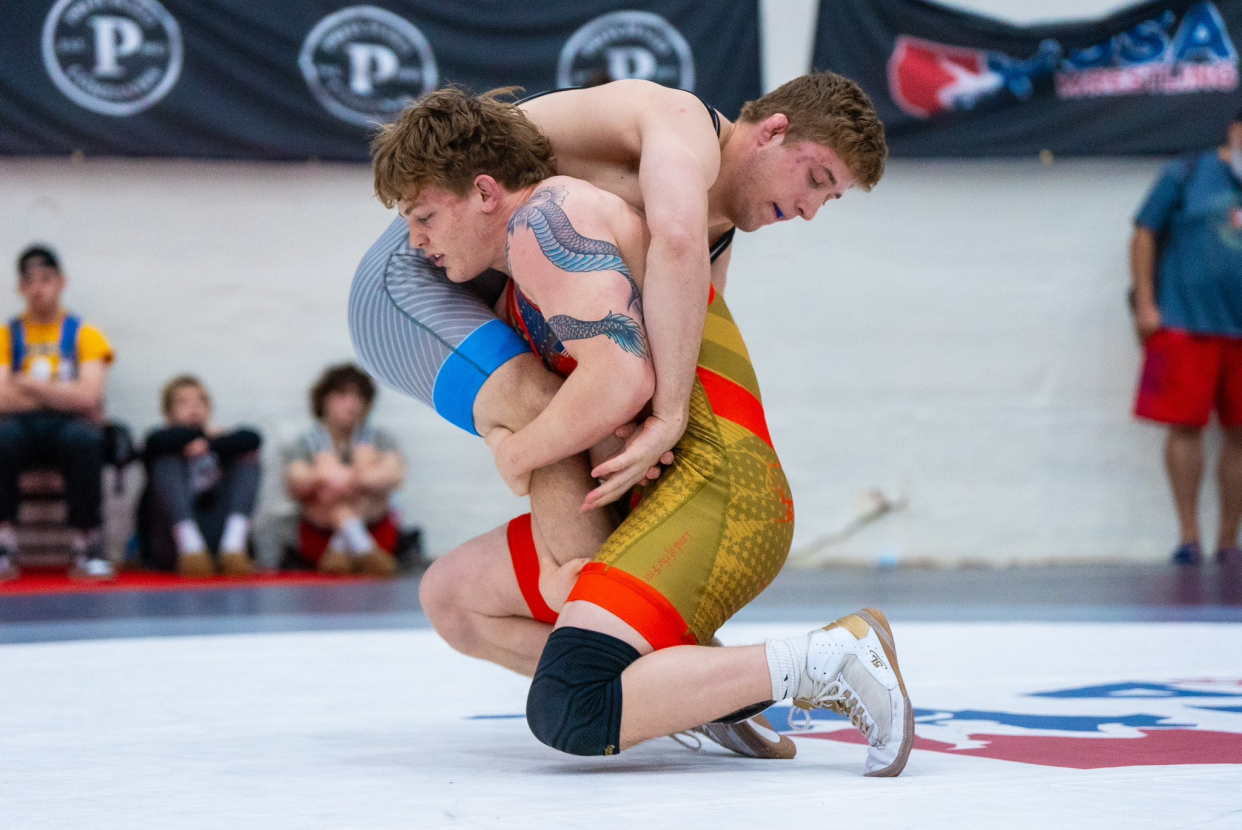 Camden McDanel, right, controls Cole Mirasola during the 97 kilograms final in the U.S. Open Wrestling Championships on Saturday in Las Vegas. McDanel, a Teays Valley graduate, won 5-1 for his second consecutive U20 freestyle title.