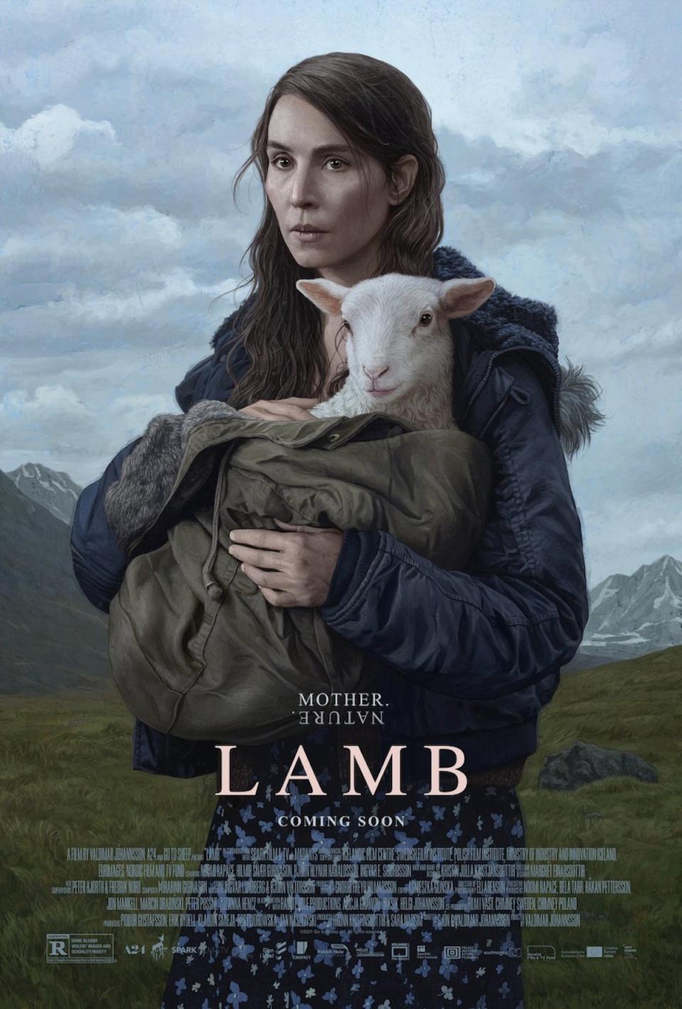 A woman holds a goat on a mountainside in a poster for A24's Lamb