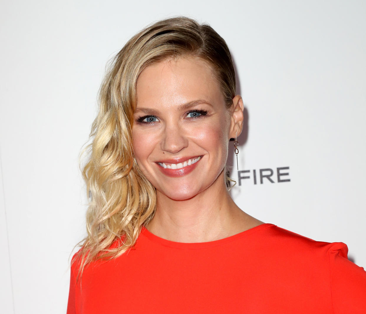 Here’s where you can buy January Jones’ classic red one-piece swimsuit (just in time for Memorial Day!)