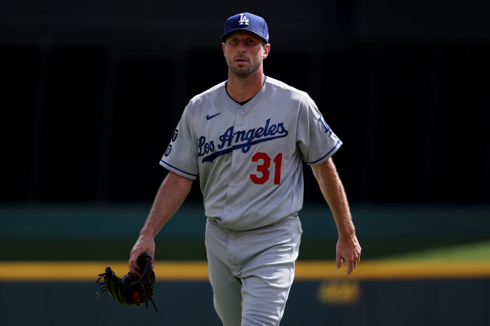 CINCINNATI, OHIO - SEPTEMBER 18: Max Scherzer #31 of the Los Angeles Dodgers walks across the field before the game against the Cincinnati Reds at Great American Ball Park on September 18, 2021 in Cincinnati, Ohio. (Photo by Dylan Buell/Getty Images)