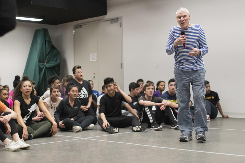 FILE - Dancer-choreographer Jacques d'Amboise speaks to current and former students during the National Dance Institute alumni homecoming celebration at NDI headquarters in New York on March 3, 2018. D'Amboise, who grew up on the streets of upper Manhattan to become one of the world's premier classical dancers at New York City Ballet and spent the last four and a half decades providing free dance classes to city youth at his National Dance Institute, died Sunday, May 2, 2021. He was 86. His death was confirmed by Ellen Weinstein, director of the institute. (AP Photo/Mary Altaffer, File)