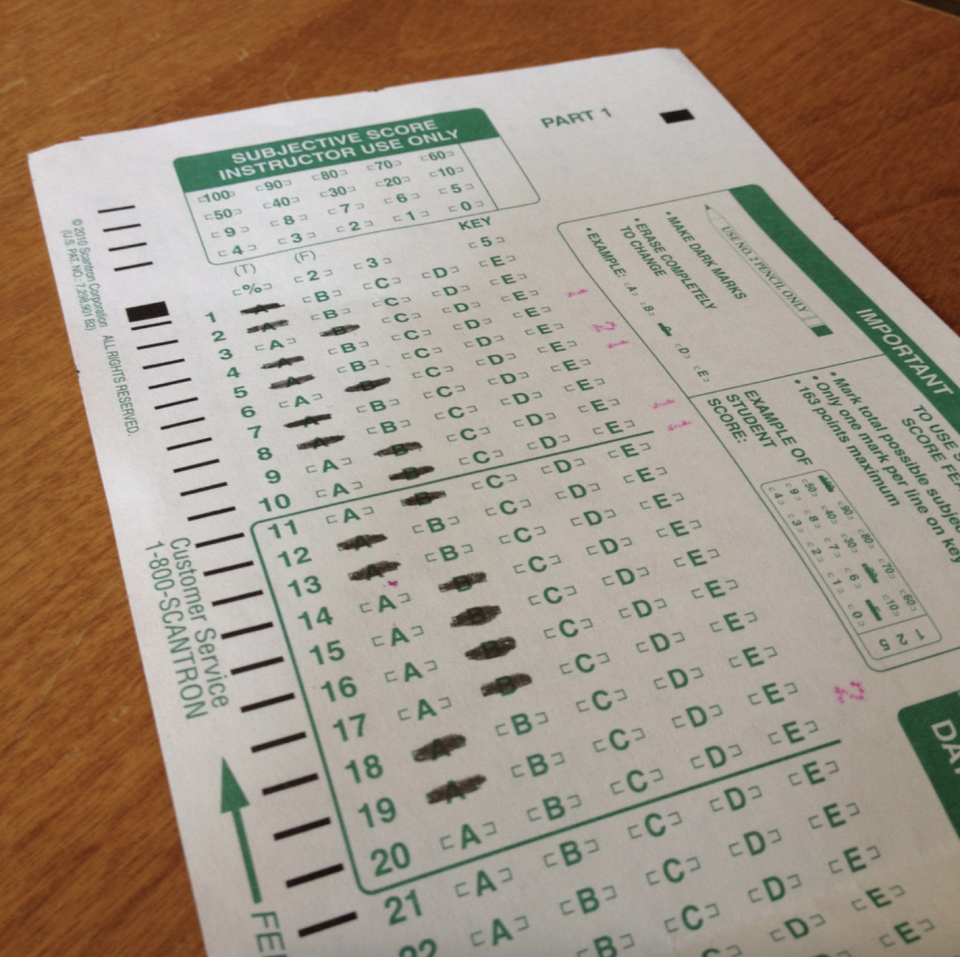 Scantron standardized test answer sheet with multiple-choice questions filled in