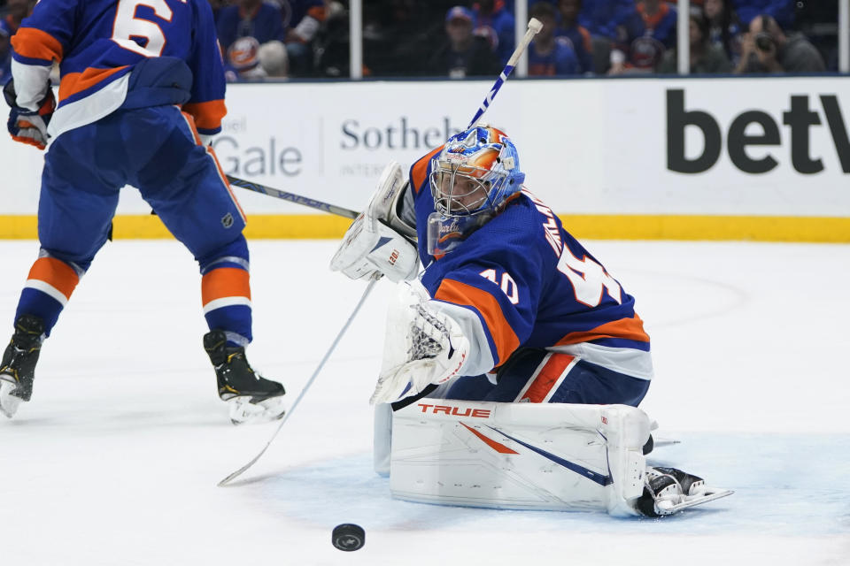 New York Islanders goaltender Semyon Varlamov (40) stops a Boston Bruins shot during the third period of Game 3 in an NHL hockey second-round playoff series Thursday, June 3, 2021, in Uniondale, N.Y. (AP Photo/Frank Franklin II)