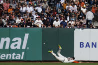 San Francisco Giants right fielder Joc Pederson is unable to catch a two-run double by Arizona Diamondbacks' Sergio Alcántara during the seventh inning of a baseball game in San Francisco, Saturday, Oct. 1, 2022. (AP Photo/Godofredo A. Vásquez)