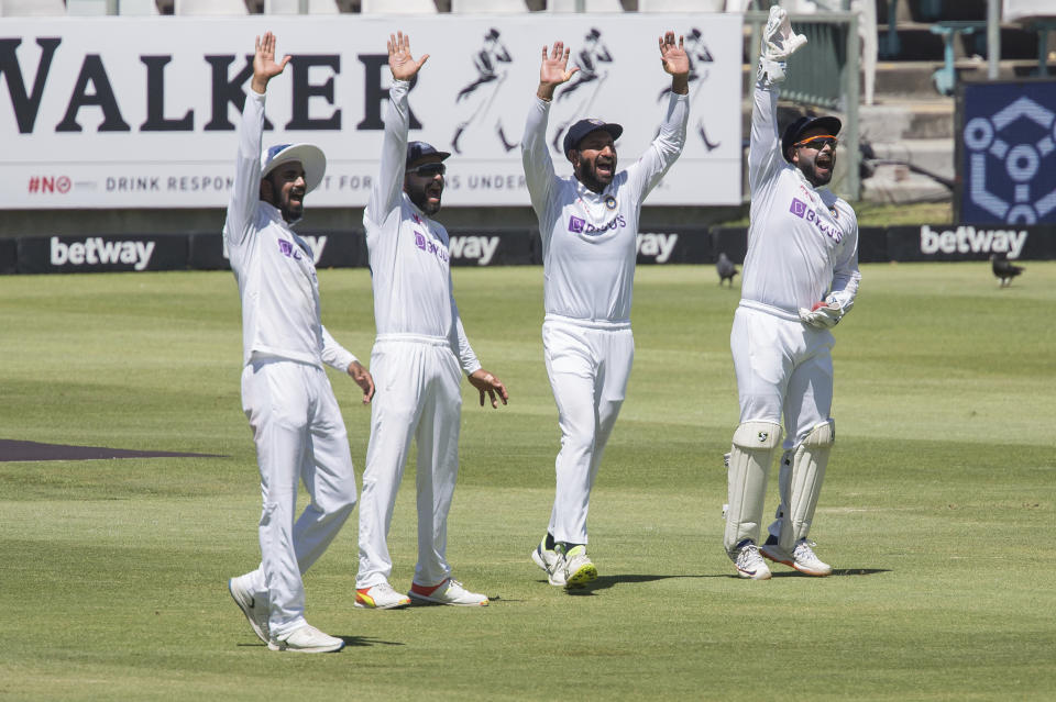 Indian players appeal for a wicket during the fourth day of the third and final test match between South Africa and India in Cape Town, South Africa, Friday, Jan. 14, 2022. (AP Photo/Halden Krog)