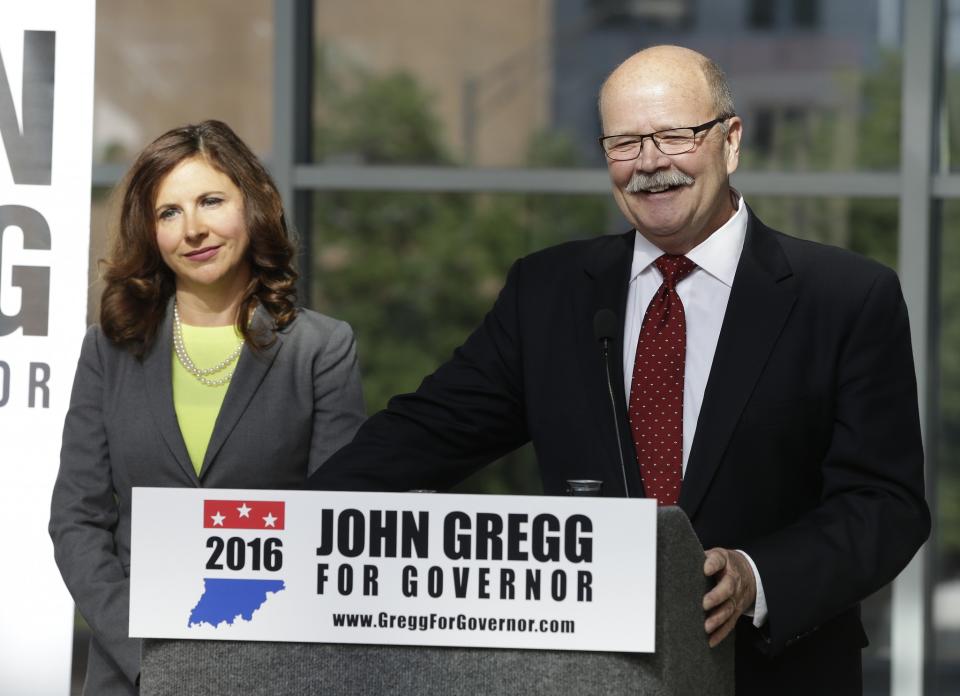 Democratic Indiana gubernatorial candidate John Gregg and Indianapolis state Rep. Christina Hale listen to a question during a news conference, Wednesday, May 25, 2016, in Indianapolis. Gregg announced that Hale will be his running mate. (Photo: Darron Cummings/AP)