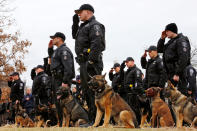 <p>K-9 Officers with their K-9 partners attend a memorial for Port Authority K-9 Aren, at the Law Enforcement Memorial along the north shore of the Allegheny River in downtown Pittsburgh Thursday, Feb. 4, 2016. A person was shot and killed by police and Aren was stabbed and killed during an incident Sunday in Wilkinsburg, Pa, near Pittsburgh. (AP Photo/Gene J. Puskar)</p>