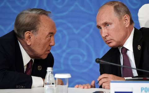 Vladimir Putin's spokesperson said he spoke to Mr Nazarbayev by phone before his resignation - Credit: ALEXEY NIKOLSKY/AFP/Getty Images