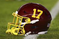 FILE - The helmet of Washington Football Team wide receiver Terry McLaurin (17) is shown before an NFL football game against the Philadelphia Eagles Tuesday, Dec. 21, 2021, in Philadelphia. Washington's NFL team said Tuesday, Jan. 4, 2022, it will unveil its new name on Feb. 2. Team president Jason Wright confirmed that the name will not be Wolves or RedWolves. He cited trademark challenges for not going down that path that was popular among fans. (AP Photo/Rich Schultz, File)