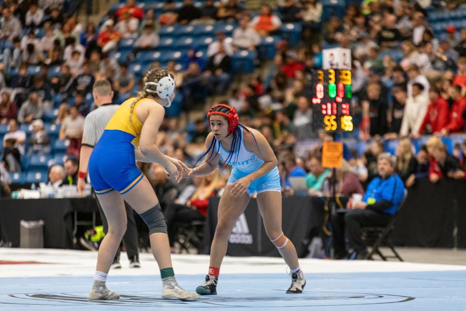 Tecumseh-Shawnee Heights' Cianna Graves takes on Olathe South's Justice Thomas during 6-5A Girls State Wrestling on Saturday, Feb. 24, 2024.