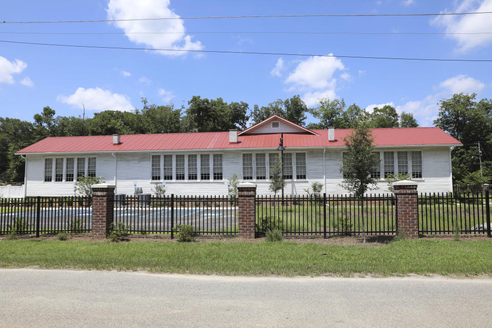 A restored Rosenwald School sits in St. George, S.C.., on Tuesday, July 11, 2023. Jewish businessman Julius Rosenwald donated money to help build 5,000 schools for Black students across the American South a century ago. In the past decade, Ralph James has secured more than $2 million in grants, money from the state and gifts from corporations and others, to restore his old school. (AP Photo/Jeffrey Collins)