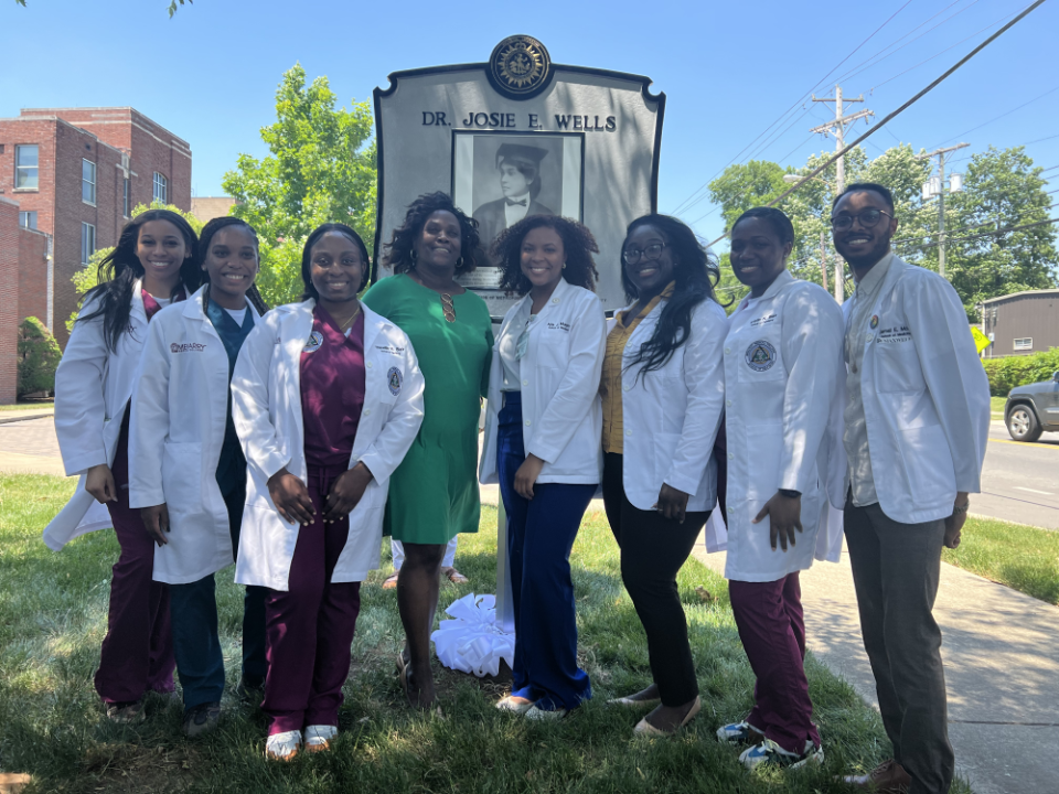 Students from Meharry Medical College pose in front of a historical marker honoring Dr. Josephine English Wells. Pictured left to right, Taylor King, Melissa Romain, Shineille Blair, Ms. Taylor, Ajia Murphy, Brittny Dike, Kristin Blair, Jamal Moss.