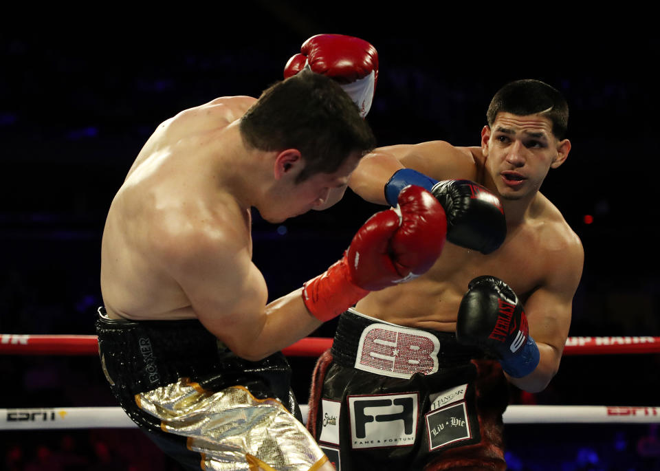 NEW YORK, NEW YORK - DECEMBER 14:  Edgar Berlanga punches Cesar Nunez during their super middleweight bout at Madison Square Garden on December 14, 2019 in New York City. (Photo by Al Bello/Getty Images)