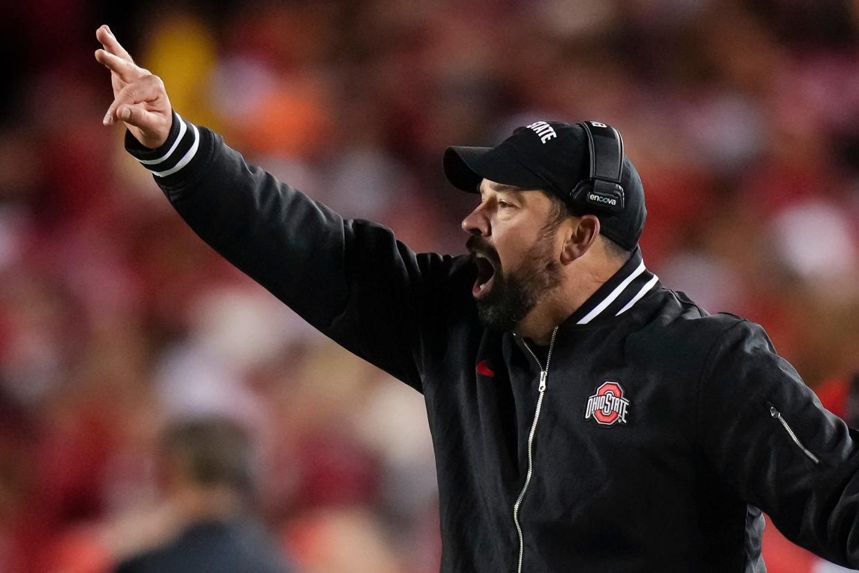 Oct 28, 2023; Madison, Wisconsin, USA; Ohio State Buckeyes head coach Ryan Day signals to his players during the NCAA football game against the Wisconsin Badgers at Camp Randall Stadium. Ohio State won 24-10.