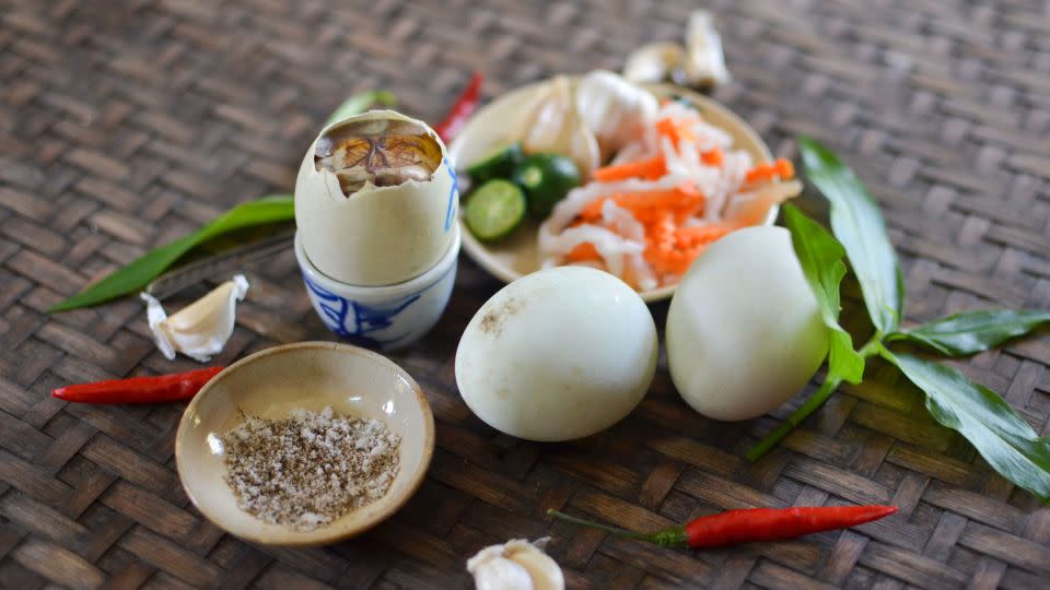 Balut is an 14-21-day-old fertilized duck egg dish, often served with rock salt as a seasoning. - Leekhoailang/iStockphoto/Getty Images