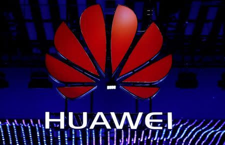FILE PHOTO: The Huawei logo is seen during the Mobile World Congress in Barcelona, Spain, February 26, 2018. REUTERS/Yves Herman