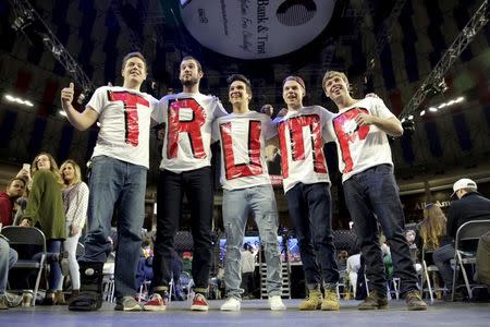 Liberty University students and supporters of Republican presidential candidate Donald Trump wear letters spelling his name before his speech at Liberty University in Lynchburg, Virginia, January 18, 2016. REUTERS/Joshua Roberts