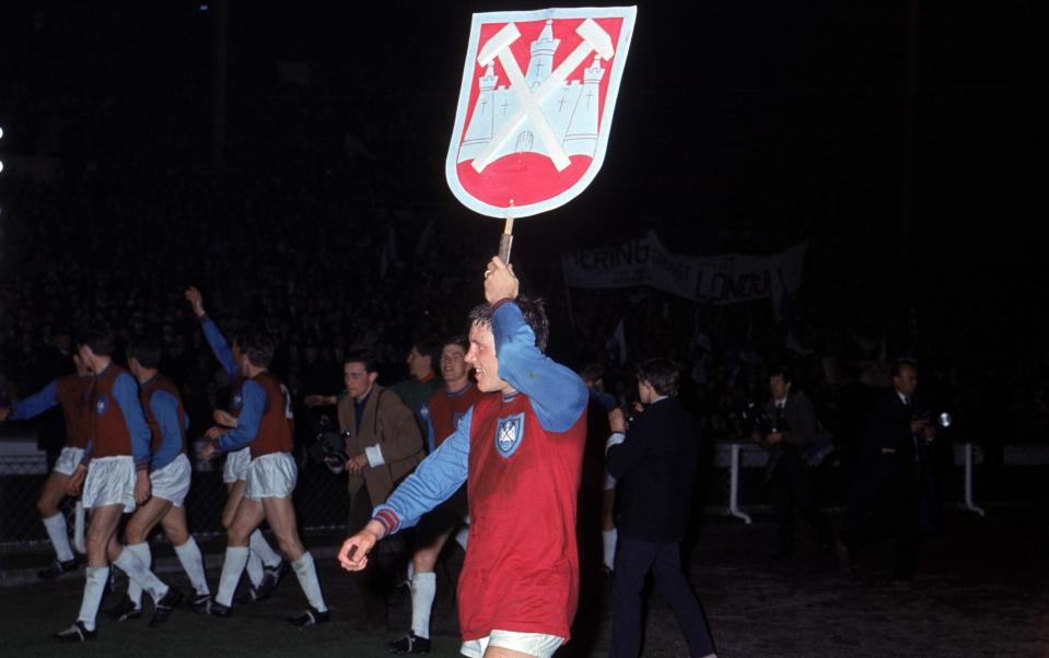 West Ham United's Brian Dear parades a giant version of the club's badge around Wembley after his team's 2-0 win the European Cup Winners Cup - Brian Dear interview: ‘We were mainly from Barking, Dagenham, East Ham’ – West Ham’s European win - PA