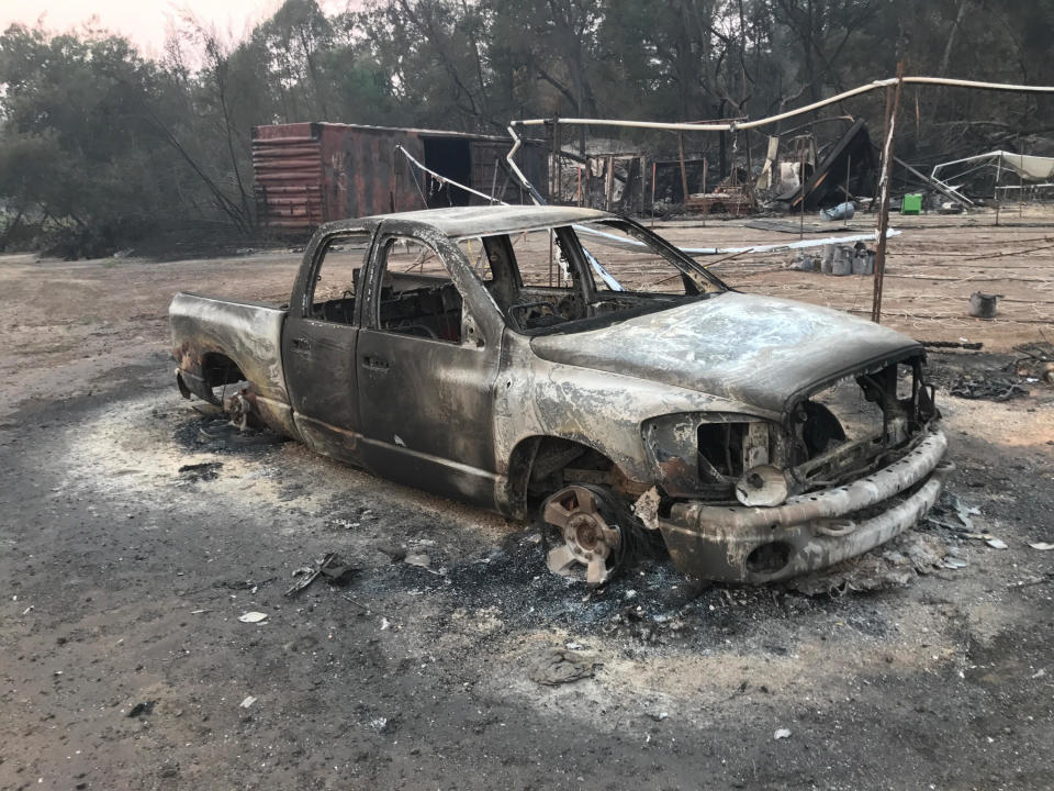 The&nbsp;charred remnants of a truck on Pearson's farm. (Photo: Erich Pearson)