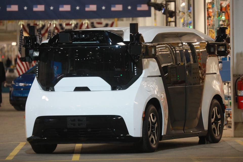 Cruise Origin, a purpose-built electric, self-driving, shared vehicle sits on display before U.S. President Joe Biden speaks at the grand opening of GM's Detroit-Hamtramck EV Factory Zero on Nov. 17, 2021.  The president added $7.5 billion to create new electric vehicle charging stations as part of his infrastructure package recently passed by Congress and signed into law on Monday.