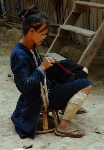Northern Laos' different ethnic hilltribes have given up the culture of poppy. And for some villagers, like the 1,500 ethic minority Hmong of Hathyao, rubber has provided a new way of life