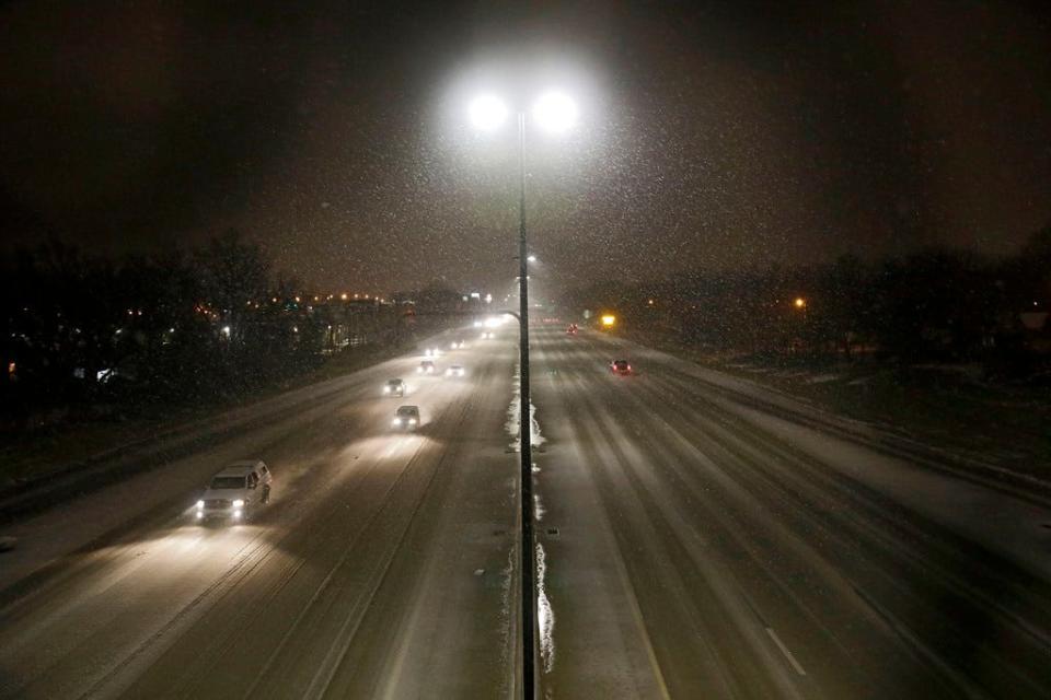 Commuters travel in snow and a wintry mix on I-244 on Feb. 5, 2020 in Tulsa, Okla.