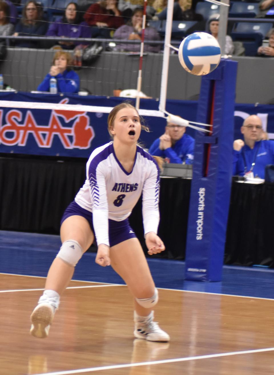 Athens setter Alaina Brubaker (8) looks for a tip across the net Saturday in the D4 State Finals.