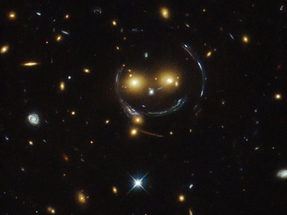 gravitational lensing hubble space telescope stars galaxies outer
