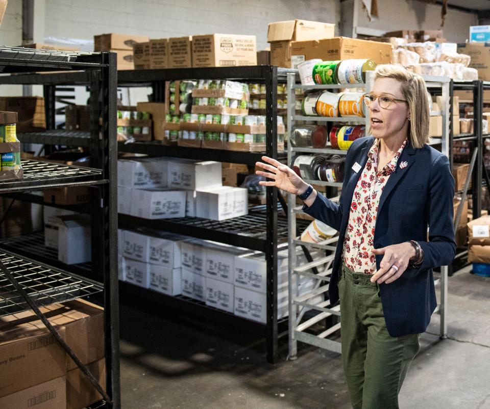 Lauren Stephens, Director of Social Services in Greenville County at The Salvation Army, shows where canned good in a warehouse at the WomenÕs and MenÕs Shelter property, Wednesday, November 10, 2021. 