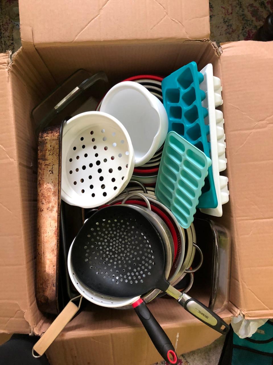 Pots, pans and ice cube trays donated by Binghamton University students when they move out in May. All items are cleaned and donated to local organizations that can use them as part of the Binghamton Move Out Project.