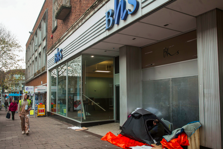 Shelter: Justin Wilson has been sleeping outside the store since it closed last year (SWNS)