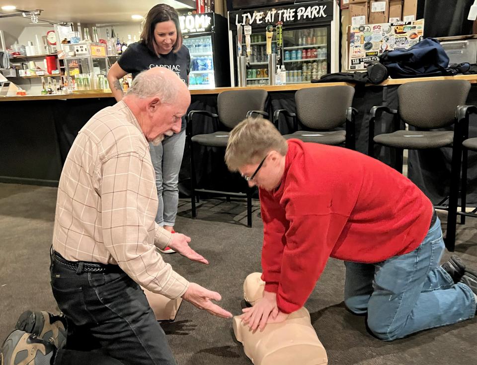 Cardiac arrest survivors John Shea, left, and Lisa Cardillo provide basic CPR training at Park Theatre on Wednesday, Nov. 15, 2023.