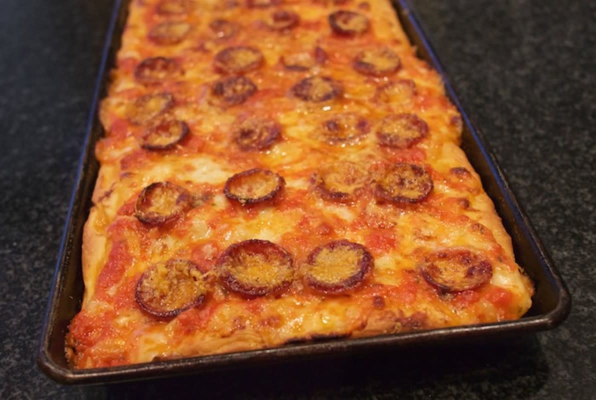 <p>The Food Hunter’s Guide to Cuisine</p><p>Sicilian-style pepperoni pizza has a thick crust and is a square pie baked up crispy on the bottom and light and chewy on the inside. Dense yet light all at the same time. </p><p><strong>Get the recipe: <a href="http://www.foodhuntersguide.com/2016/07/sicilian-style-pepperoni-pizza.html" rel="nofollow noopener" target="_blank" data-ylk="slk:Sicilian Style Pepperoni Pizza;elm:context_link;itc:0;sec:content-canvas" class="link rapid-noclick-resp">Sicilian Style Pepperoni Pizza</a></strong></p>