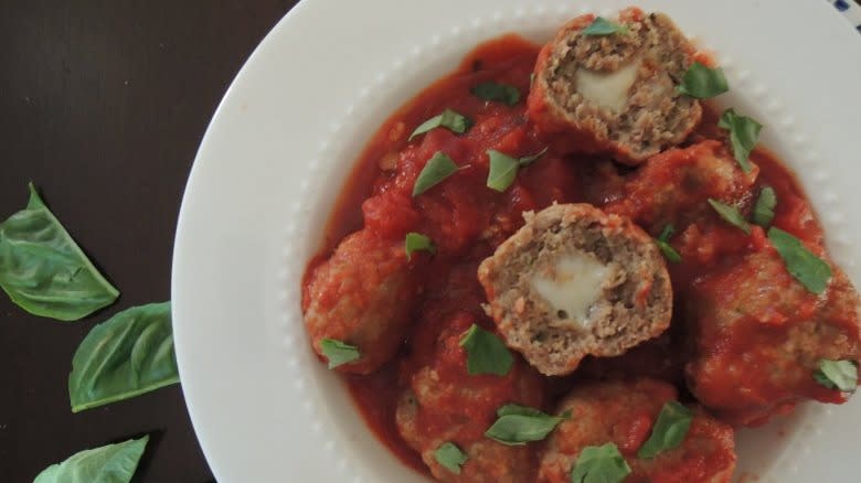 Cheese-stuffed meatballs in tomato sauce