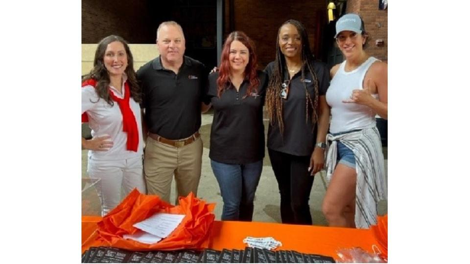 Fiserv Senior Vice President Vivian Greentree, VPs Jeff Owens and Meg Hendricks, and Shanna Wilson-Martinez, senior campus and military recruiter, attend an event with Chantal Dewall, strategic advisor and operations manager at 50strong, a national, industry-led effort supporting employers and military-affiliated jobseekers. All are veterans themselves. (Courtesy of Fiserv)