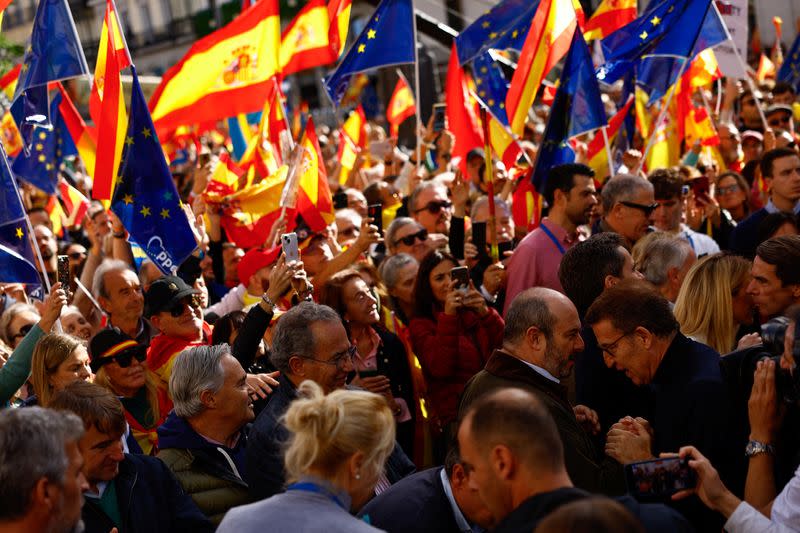 Protest after Spain's socialists reached a deal with the Catalan separatist Junts party for government support, in Madrid