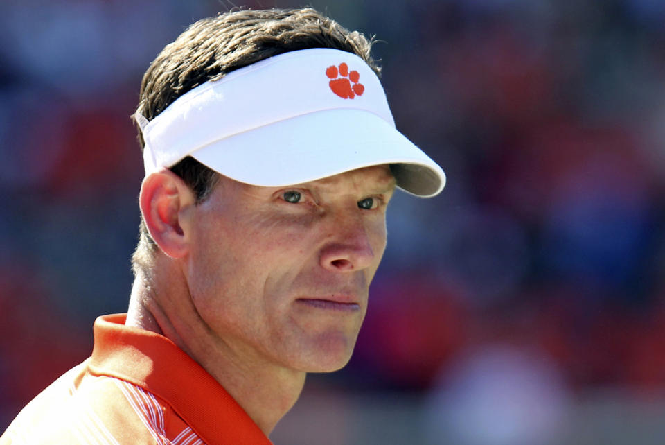FILE - In this April 1, 2012, file phot, Clemson defensive coordinator Brent Venables watches his team warm up before a spring NCAA college football game in Clemson, S.C. Venables thinks the Tigers’ struggling defense can be fixed this season, despite the second-worst showing in school history in last week’s loss at Florida State. (AP Photo/The Independent-Mail, Mark Crammer) THE GREENVILLE NEWS OUT, SENECA NEWS OUT