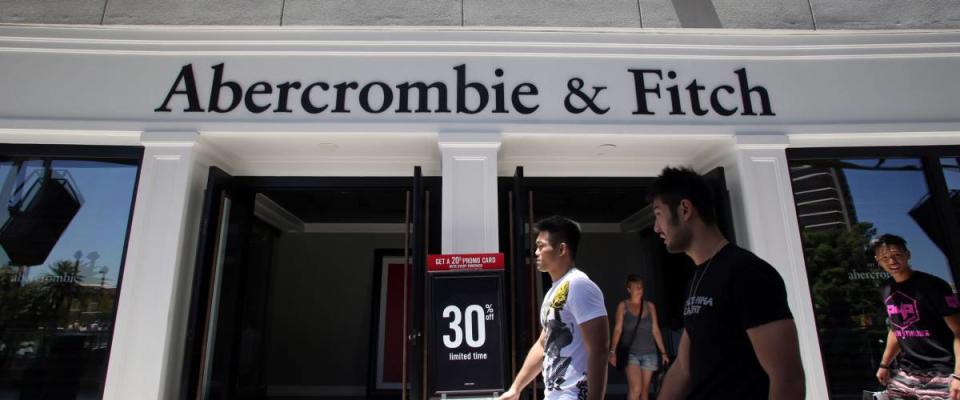 LAS VEGAS, NEVADA - FRI. JUNE 27, 2014:  Shoppers walk past an Abercrombie & Fitch clothing store in Las Vegas, Nevada, on Friday, June, 27, 2014.